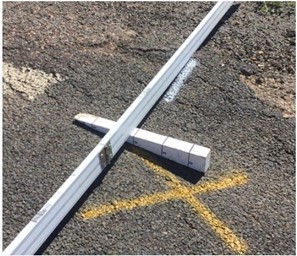 Use a straight edge / rule to demonstrate subsidence, shoving, sinkholes or scours to the asset caused by the event and to support proposed treatment and quantities. Where possible capture full length of the straight edge, and separate close up/s of the depth. . 