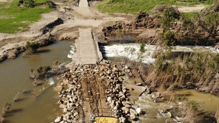 The damaged Brisbane River crossing along Scrub Creek Road, Braemore