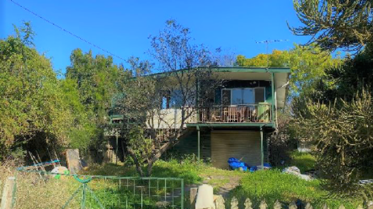 Flood-damaged house