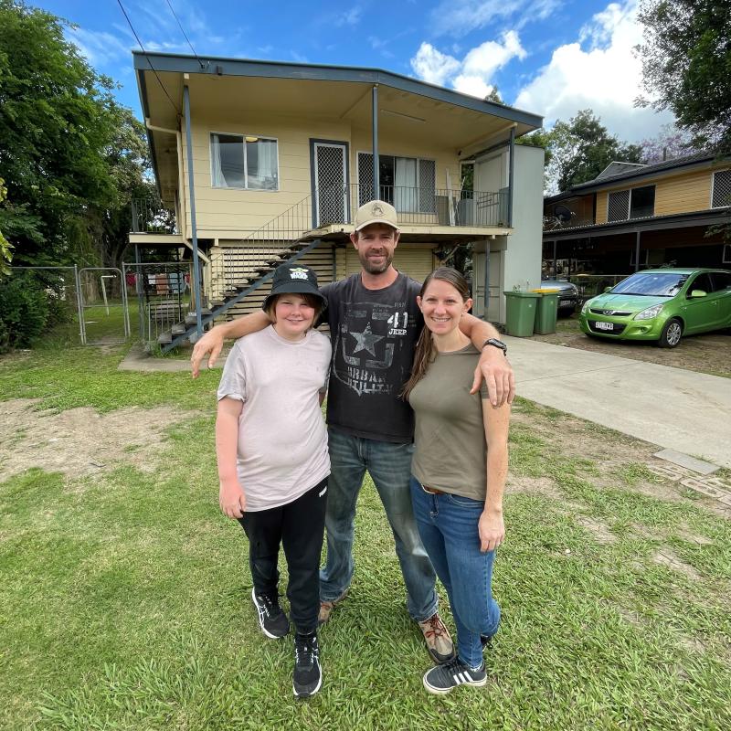 Paul, Kirsten and Jett Harding days prior to the settlement of their Enid Street home in Goodna.