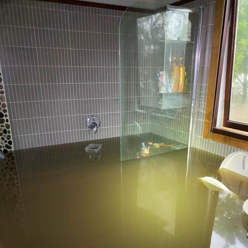 Floodwater in the family bathroom during the 2022 SEQ floods.