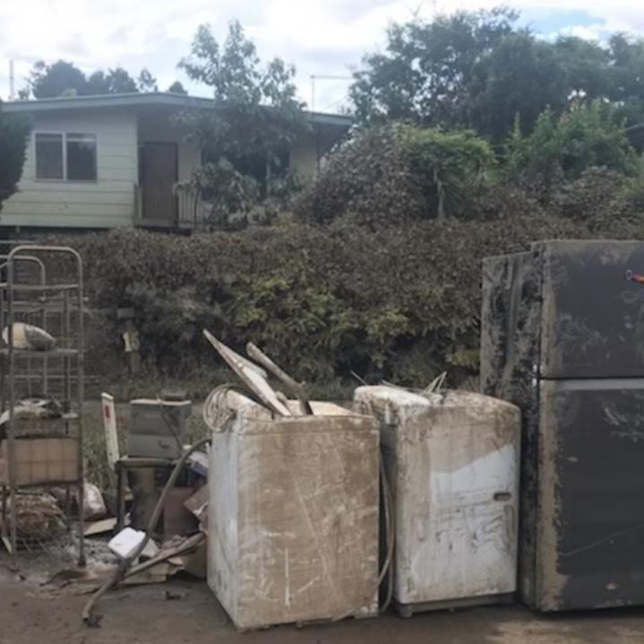 Out the front of the Onyeajum home in the aftermath of the flood.