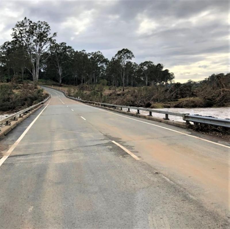 Colleges Crossing reopened to traffic after debris was removed from the bridge.