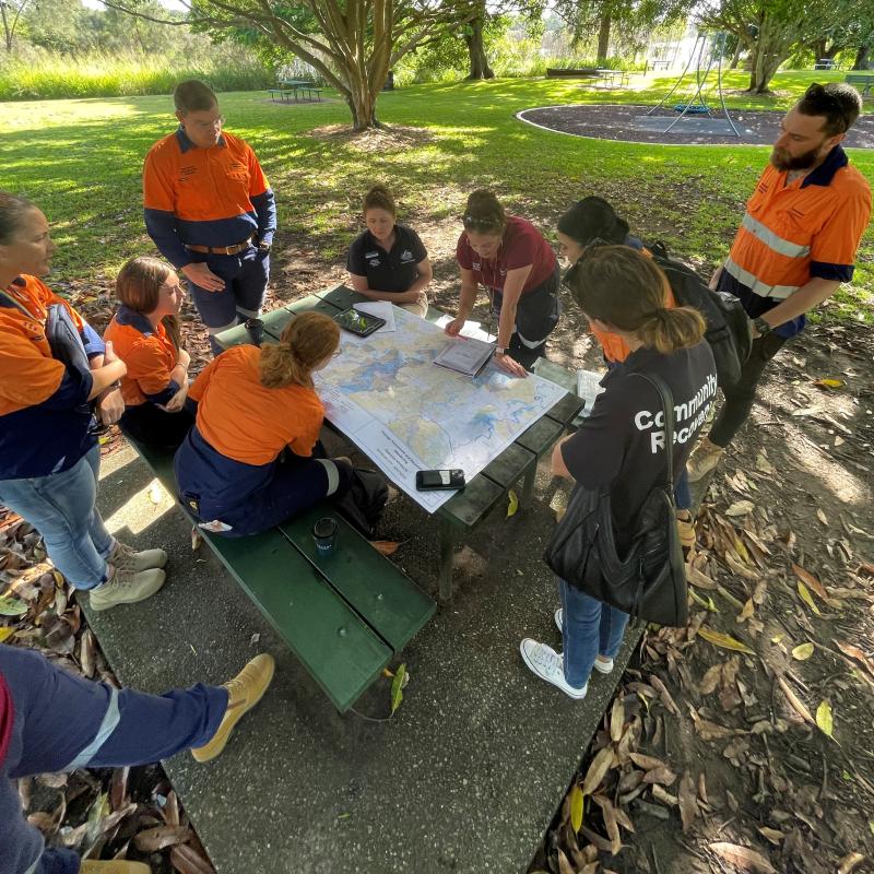 A team of DARM officers planning for the day ahead.