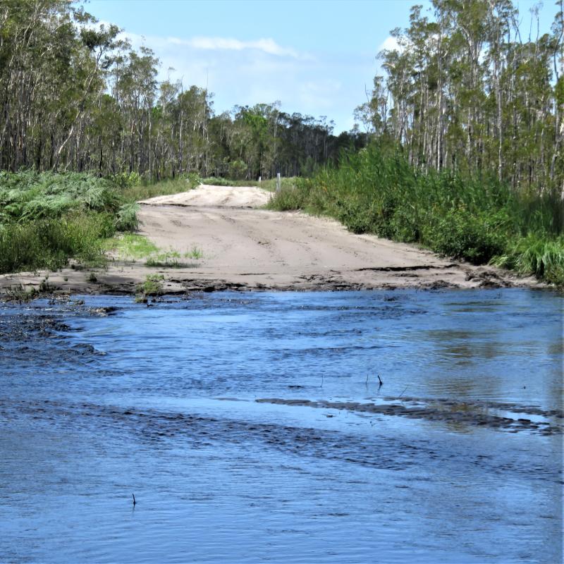 Flood water across the Northern Access Track.