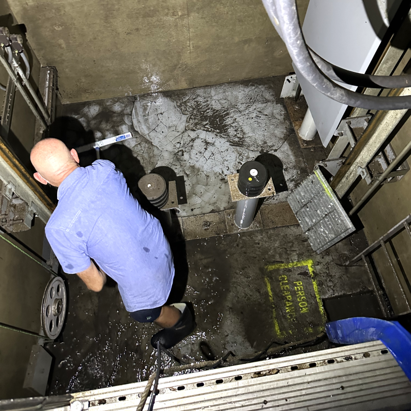 Cleaning elevator pit