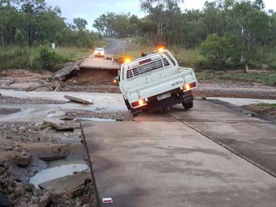 Ute stopped at washed out road