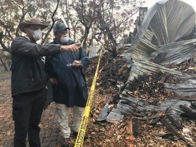 Staff inspecting damage