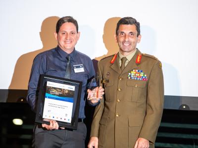 Winner from Cairns in your hands accepting the award on stage